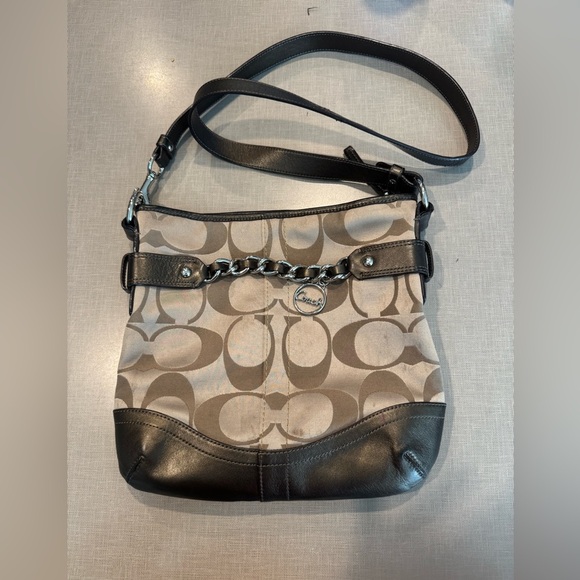 Coach Handbags - Coach Black and Tan Crossbody Bag with Signature Style